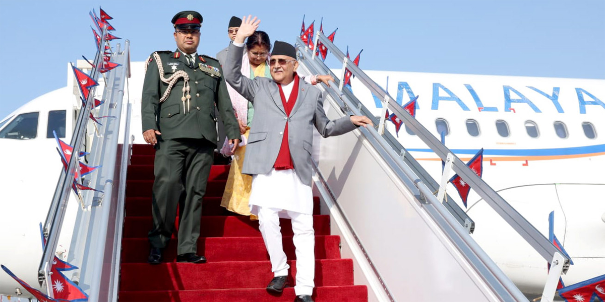 PM Oli returns from China