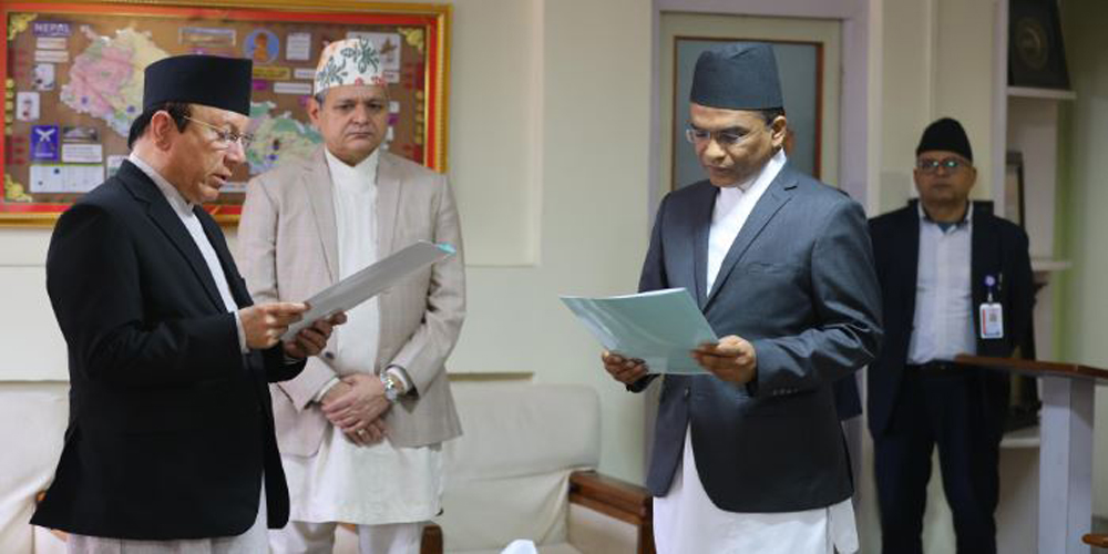Dr Biswo Poudel sworn in as 18th Governor of NRB