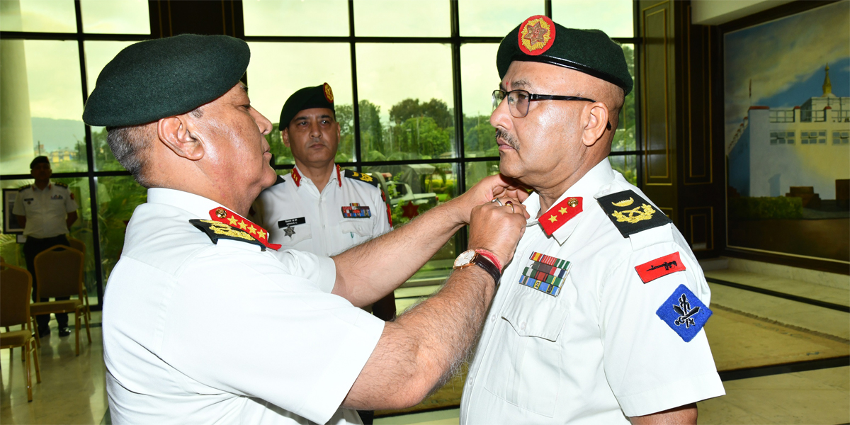Insignia of Major General conferred on KC