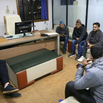 Police search media offices, take journalist into custody