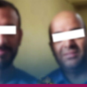 Two held for assaulting school principal
