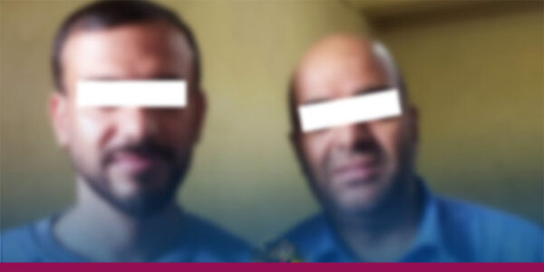Two held for assaulting school principal
